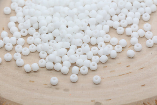 Matte white 4mm 6/0 glass seed beads with round shape and frosted finish for jewelry making and bracelet crafts