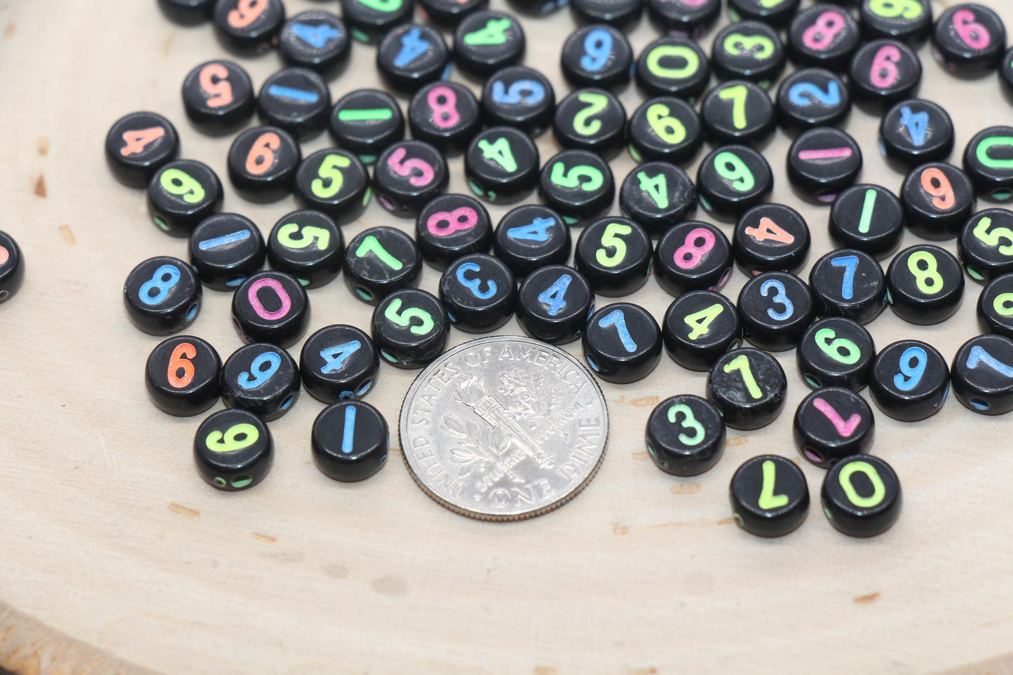 black 7 mm round acrylic number beads with neon numbers; black beads with neon numbers