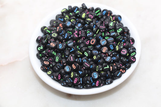black 7 mm round acrylic number beads with neon numbers; black beads with neon numbers