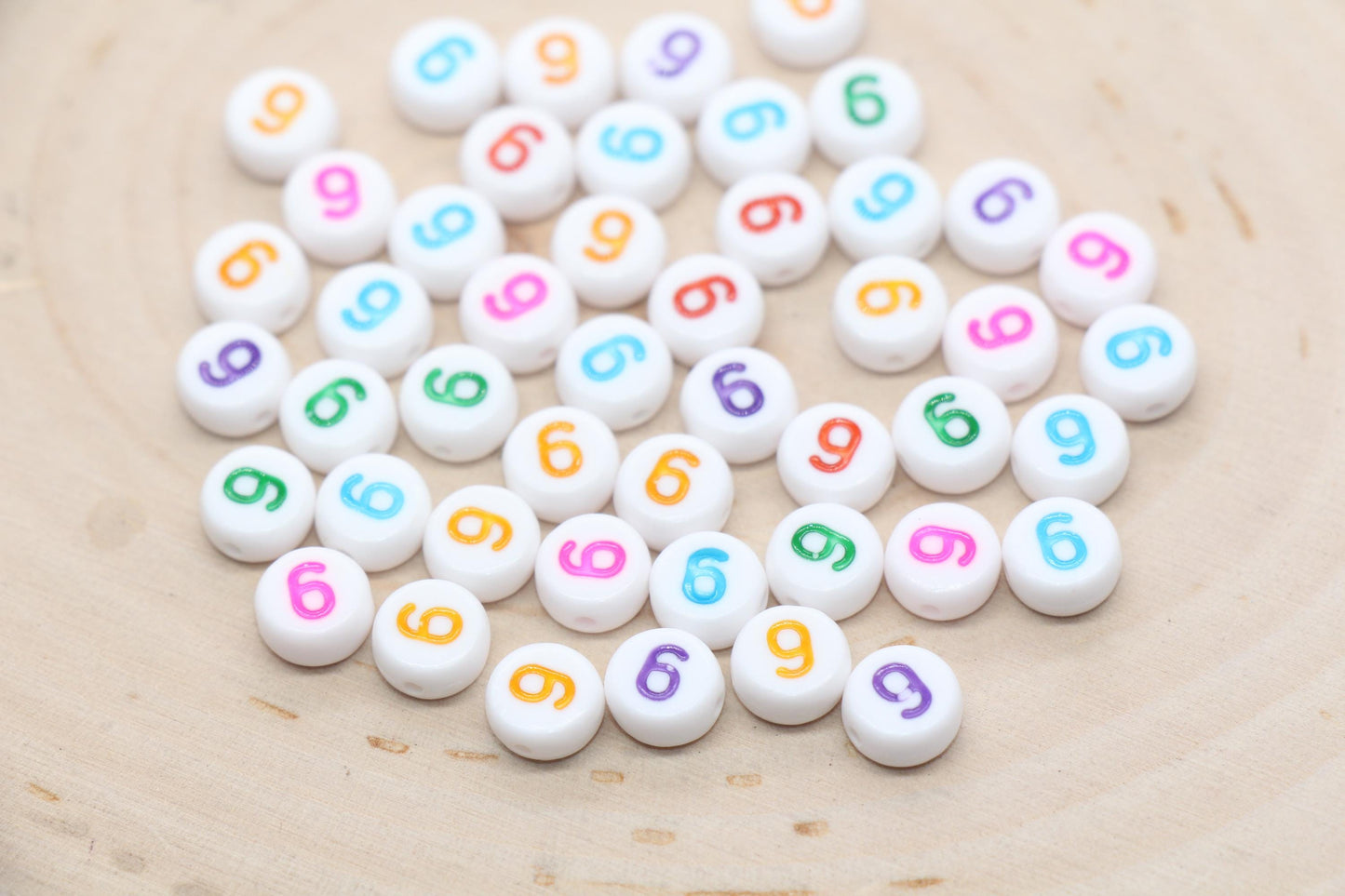 Individual 7mm round acrylic number bead, white with multicolor number 6