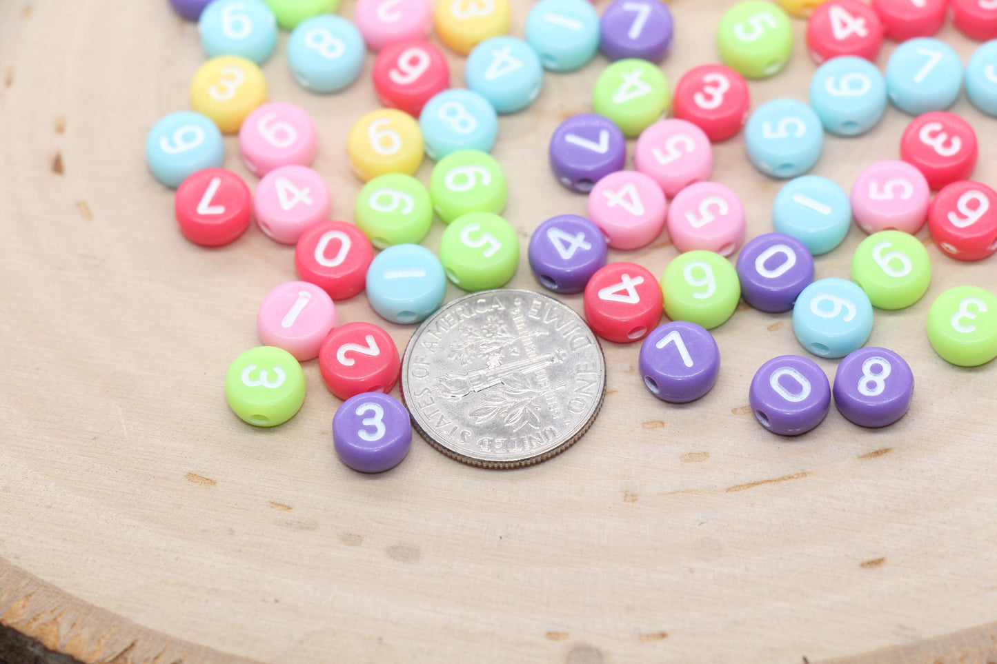 7 mm round acrylic multicolor number beads on white base; white with color numbers