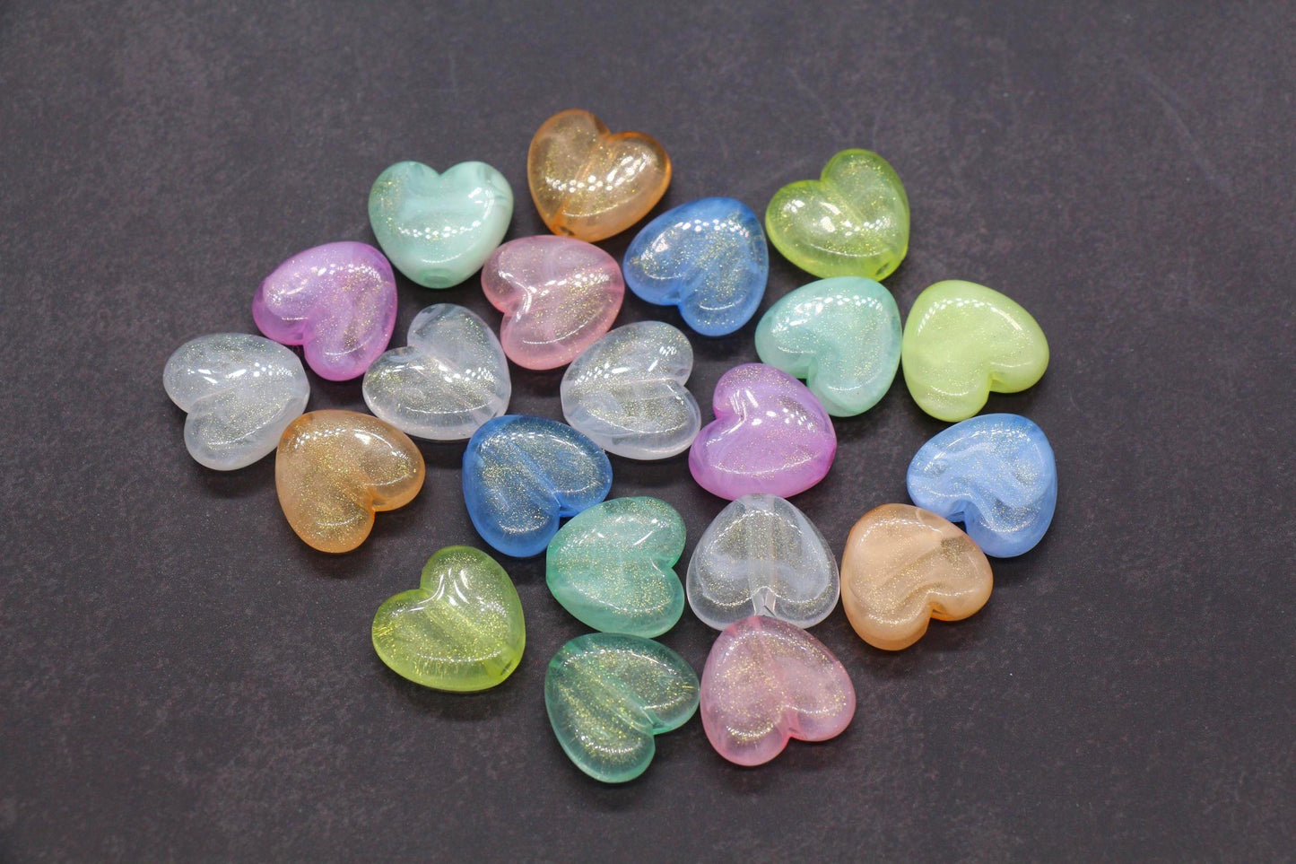 Colorful plastic heart beads with glitter finish – craft bead supplies