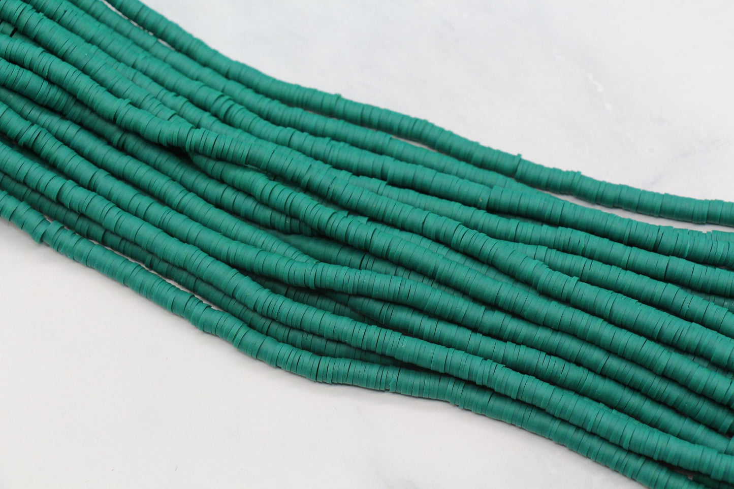 6mm dark teal green heishi beads strand close up for bracelet making
