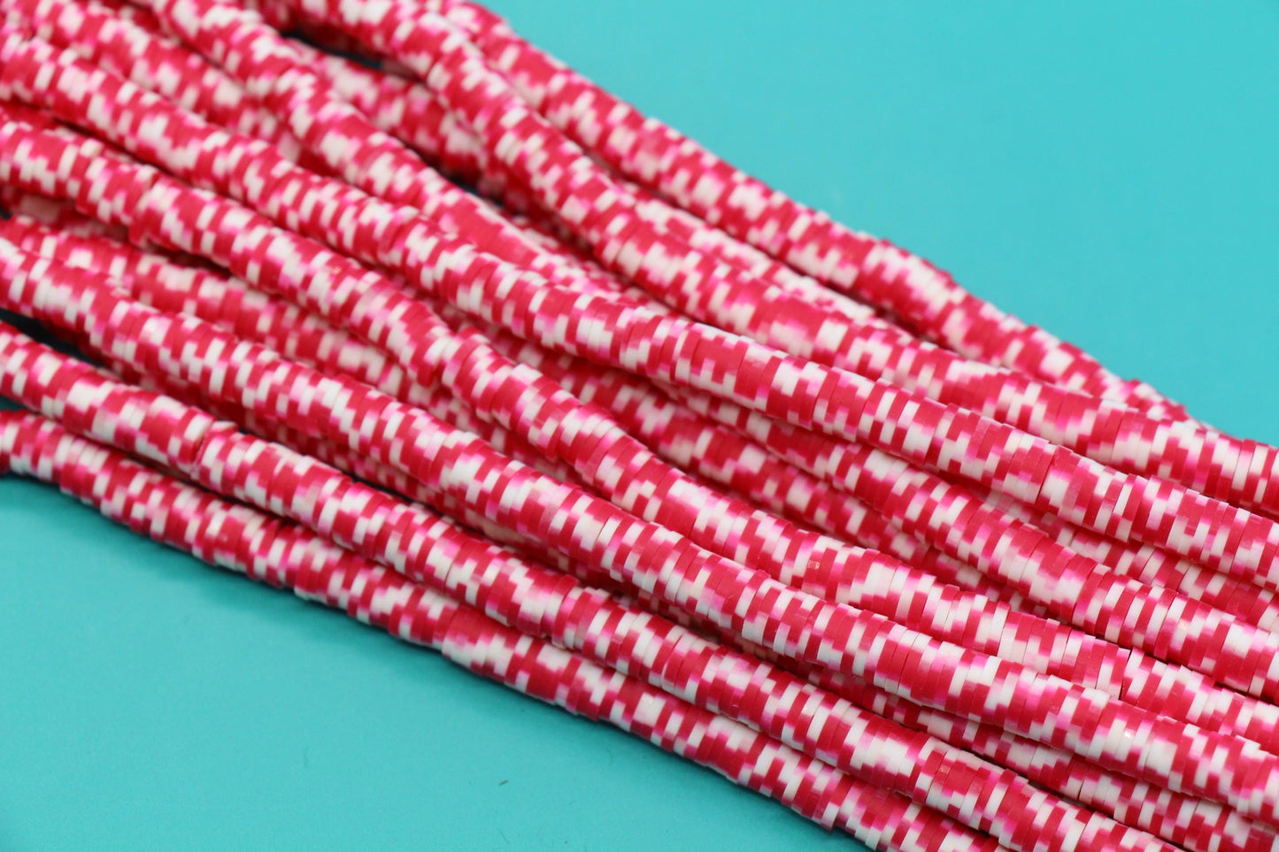 6mm pink& white striped heishi beads color detail and flat disc shape