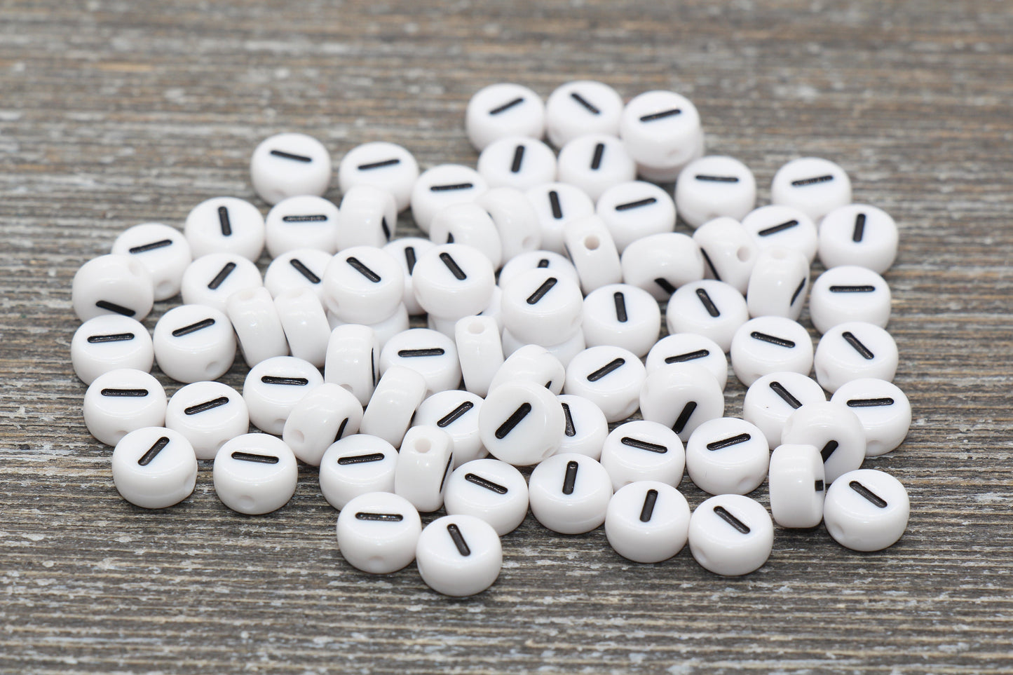 individual 7 mm flat round acrylic number beads, white with black numbers; White round bead with black number 1