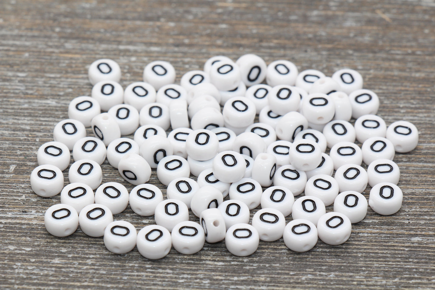 individual 7 mm flat round acrylic number beads, white with black numbers; White round bead with black number 0