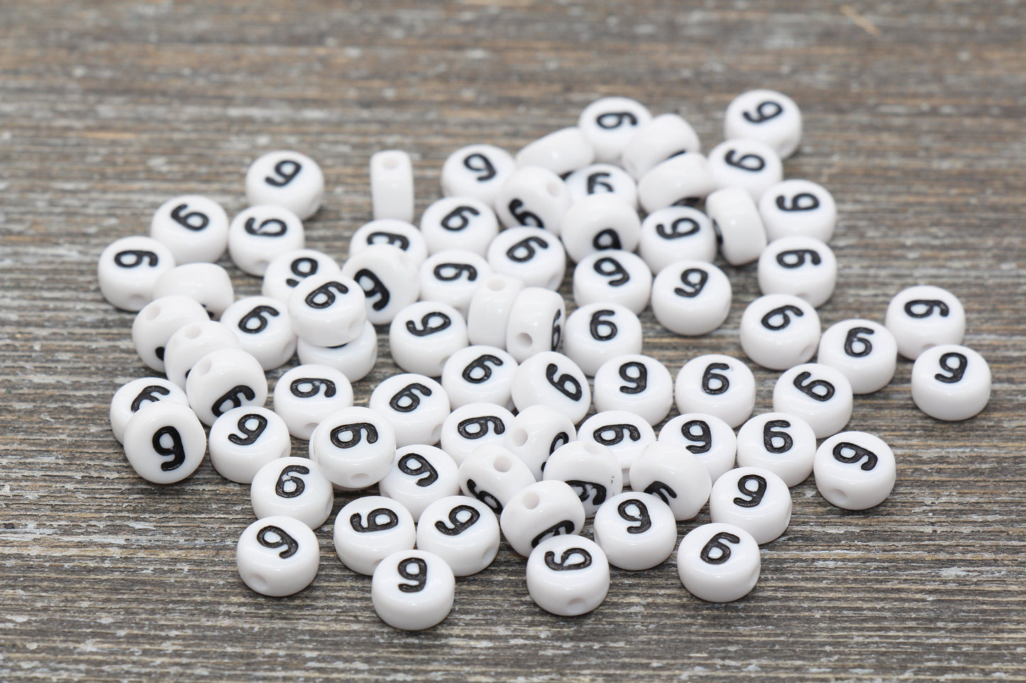 Individual 7mm flat round acrylic number bead, white with black number 6; White round bead with black number 6