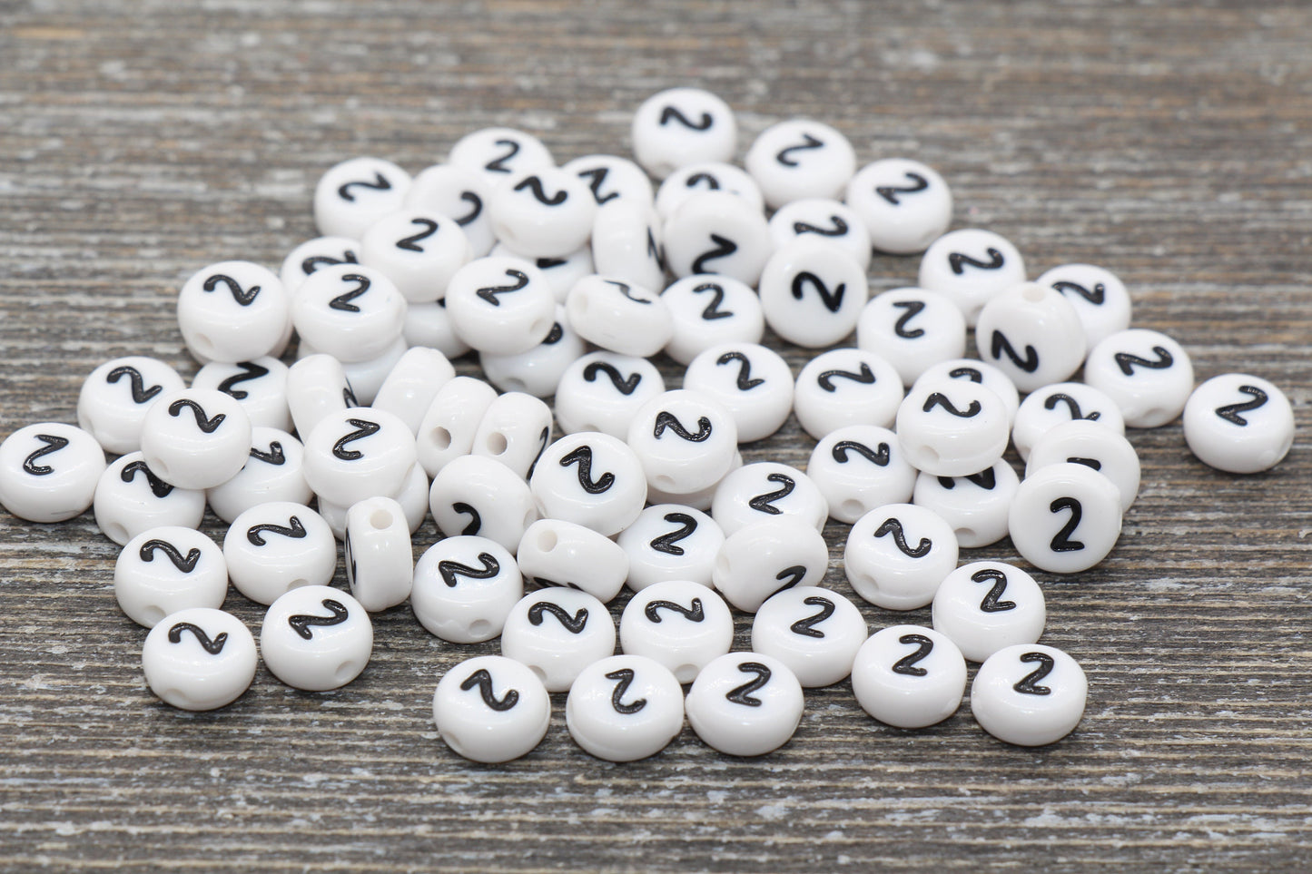 Individual 7mm flat round acrylic number bead, white with black number 2; White round bead with black number 2