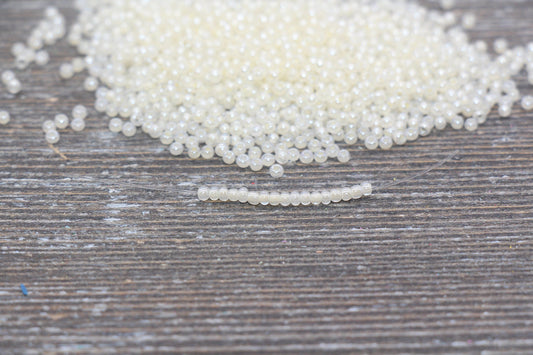 Light yellow 2 mm (12/0) glossy glass seed beads mix, rocaille rounds