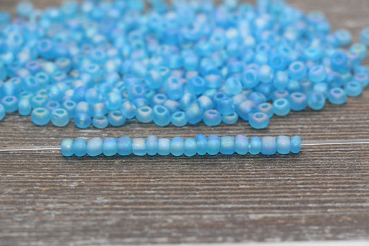 Matte blue AB 4mm 6/0 round glass seed beads with frosted iridescent finish for bracelets, jewelry making, beadwork, and DIY crafts
