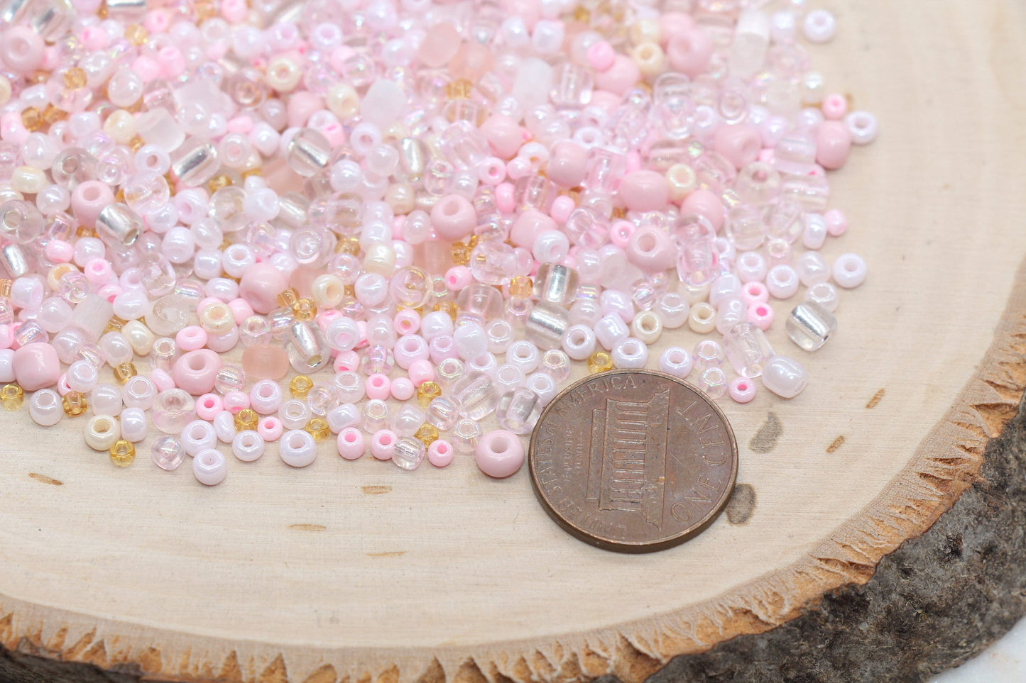 Assorted vibrant seed beads in various colors and sizes, ideal for crafting jewelry such as bracelets and necklaces and other craft