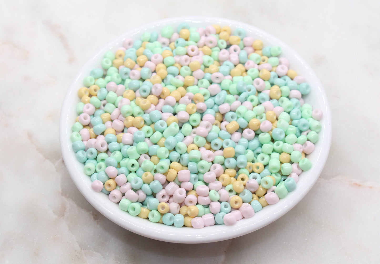 Mix Multicolor seed beads , ideal for crafting jewelry such as bracelets and necklaces and other crafts.