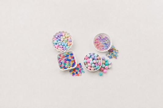 Assorted acrylic, heishi, glass and silicone craft beads for DIY projects
