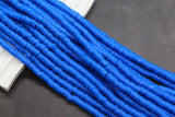 Blue beads on a dark gray background