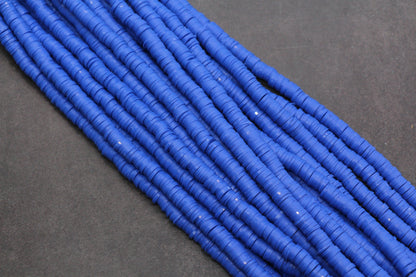 Blue beads on a dark gray background