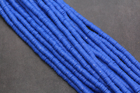 Blue beads on a dark gray background