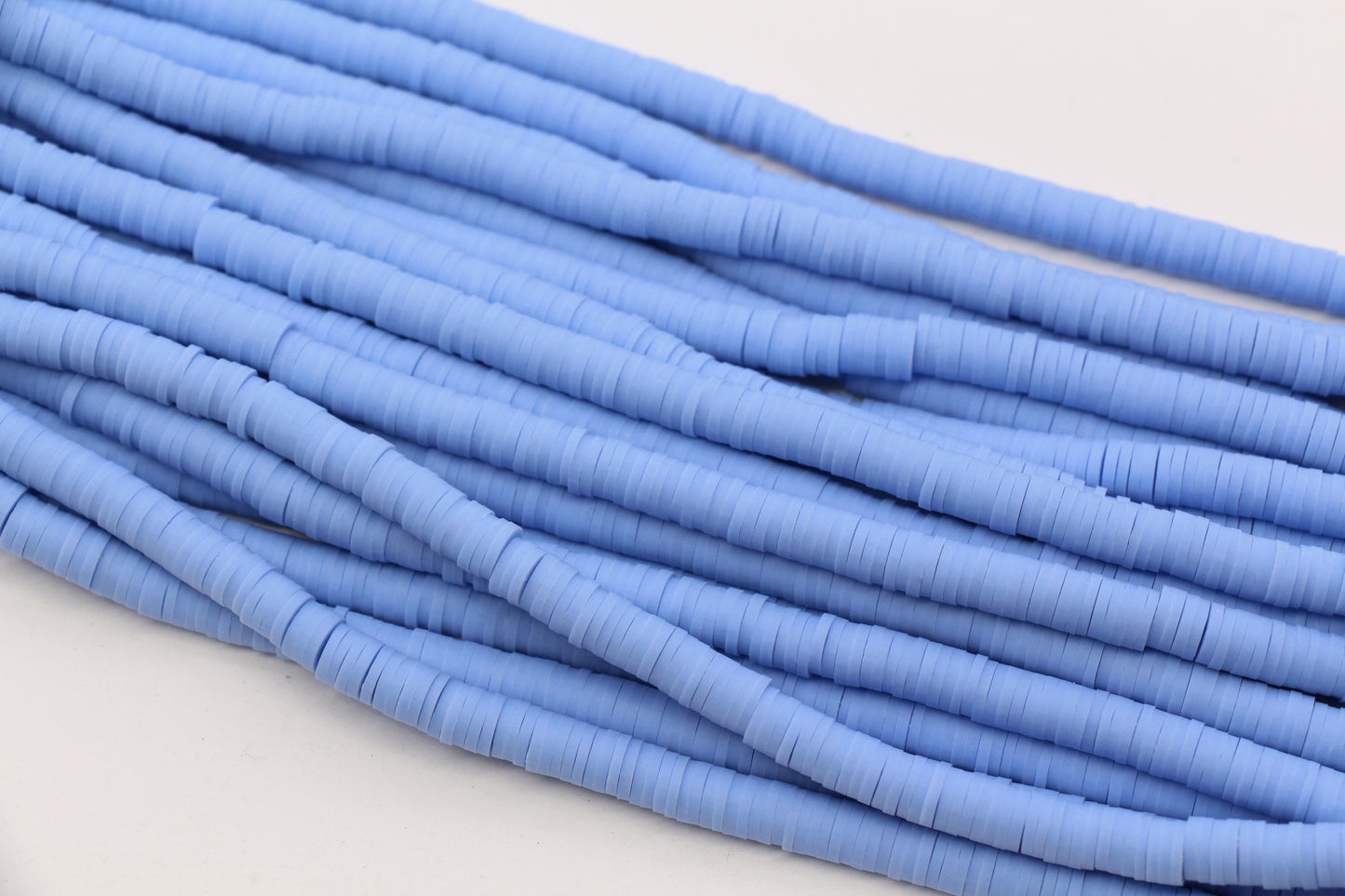 6mm periwinkle blue heishi beads strand close up for bracelet making