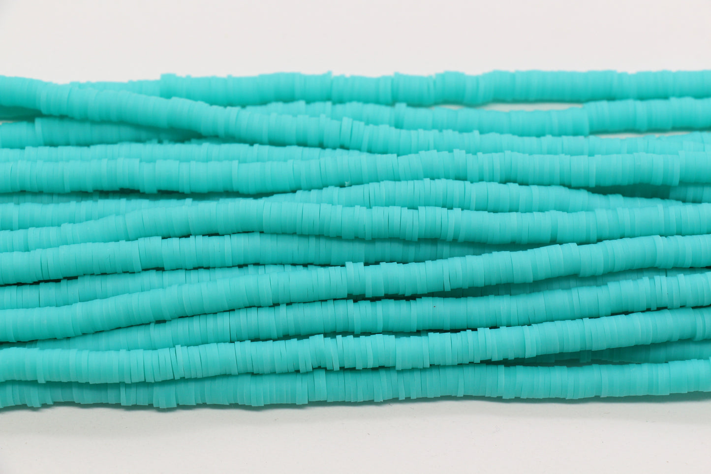 6mm aqua green heishi beads strand close up for bracelet making