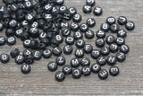Black acrylic alphabet beads with silver letters 7mm round