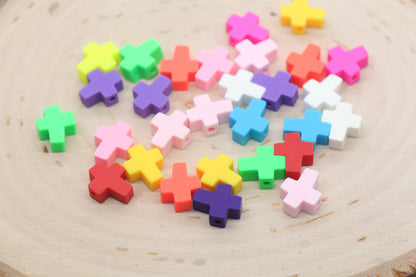 Colorful jigsaw puzzle pieces scattered on a wooden surface.