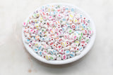 white 7 mm round acrylic number beads with multicolor numbers; white beads with multicolor numbers
