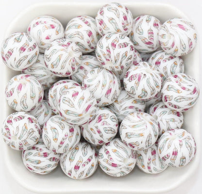 beads in a square dish with white background