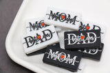Best Mom Ever and Best Dad Ever silicone focal beads in black and white with red heart — rectangular beads for DIY keychains and jewelry.