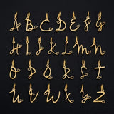Gold script initial charms with heart accents, stainless steel alphabet letter pendants for necklaces and DIY jewelry making.