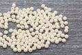 4mm Cream Acrylic Spacer Beads