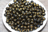 8mm black with gold cross beads, acrylic symbol beads, main photo
