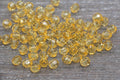 8mm Orange Transparent Faceted Acrylic Beads