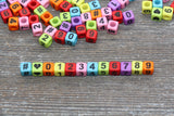 6 mm acrylic cube number beads, multicolor with symbols; multicolor cube number beads