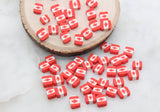 Canadian flag polymer clay beads in round and square shapes, red and white maple leaf craft beads