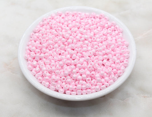 Glossy Pink Seed Beads, ideal for crafting jewelry such as bracelets and necklaces and other craft .