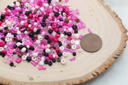 Assorted vibrant  seed beads in various colors and sizes, ideal for crafting jewelry such as bracelets and necklaces and other craft 